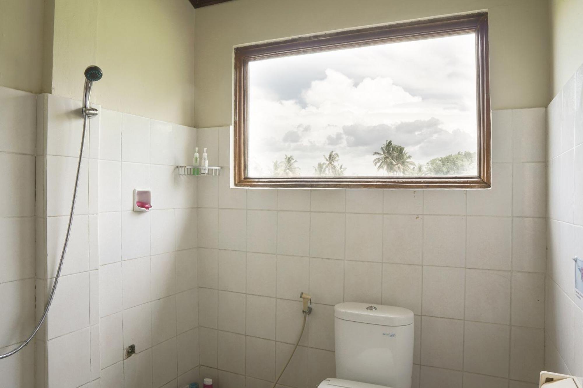 Nirwa 1 Ubud Guesthouse חדר תמונה